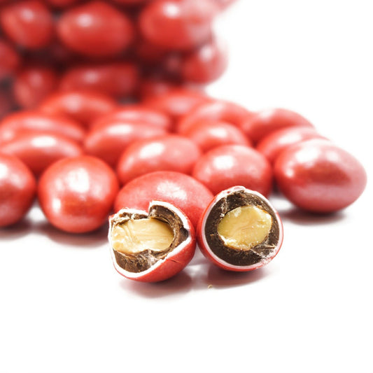 დრაჟე ნუში ფერად მინანქარში,100გრ.